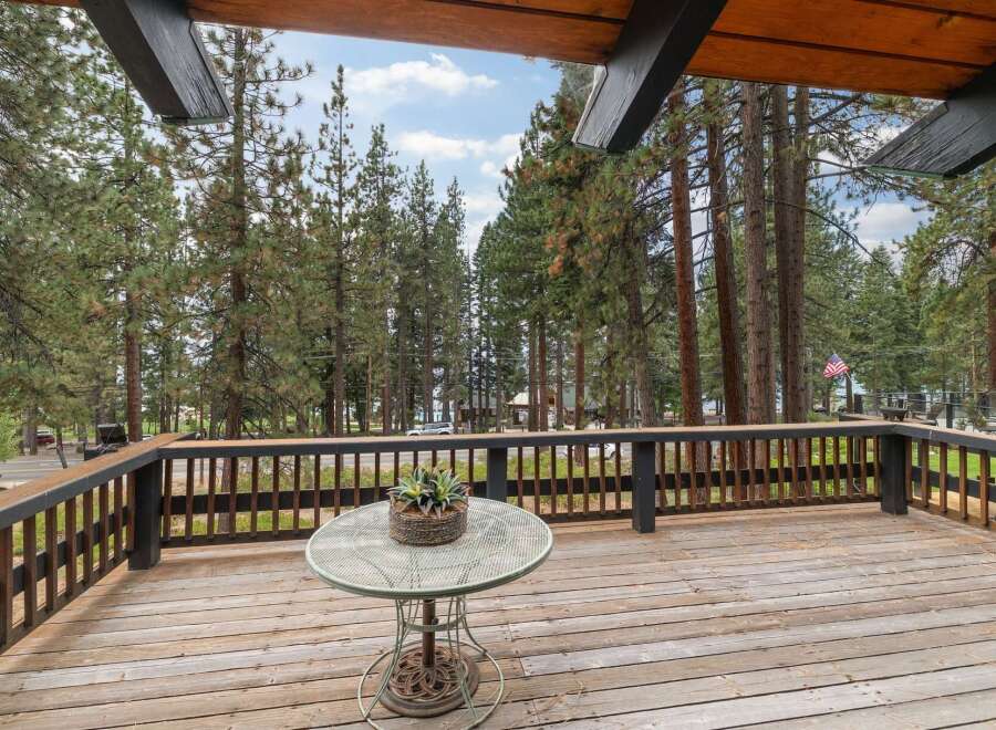 Enjoy the serene mountain views from this spacious deck, perfect for outdoor living and entertaining.