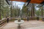 Enjoy the serene mountain views from this spacious deck, perfect for outdoor living and entertaining.