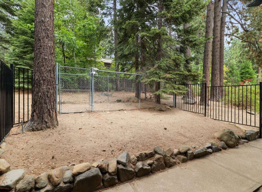 Enjoy the outdoors with this fenced-in yard, perfect for pets or entertaining.