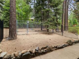 Enjoy the outdoors with this fenced-in yard, perfect for pets or entertaining.