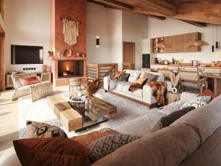 Experience cozy mountain living in this stunning open-concept living space, featuring a modern fireplace and a spacious kitchen perfect for entertaining.