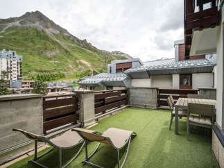 Enjoy breathtaking mountain views from this spacious balcony, perfect for relaxation and outdoor dining.