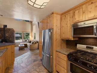 Experience the perfect blend of rustic charm and modern convenience in this open-concept living space.