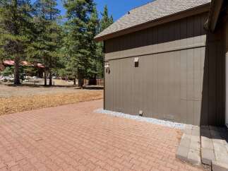 Enjoy the outdoors with this spacious paver patio, perfect for entertaining or relaxing.