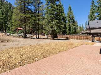 Discover this spacious backyard, perfect for outdoor living and entertaining.