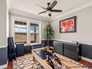 Transform your home into a personal fitness sanctuary with this dedicated workout space.