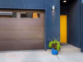 Modern architecture meets vibrant design in this striking home.