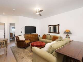 Step into this inviting living room, perfect for relaxation and entertainment.