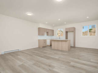 Discover modern living in this spacious open-concept kitchen and living area.