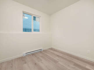 Discover this bright and airy room, perfect for a home office or additional bedroom.
