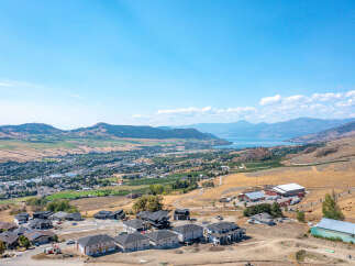 Discover this stunning new construction development offering modern homes with breathtaking panoramic views of the valley and lake.