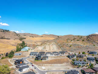 Discover modern living in this stunning new construction development nestled in a picturesque hillside setting.