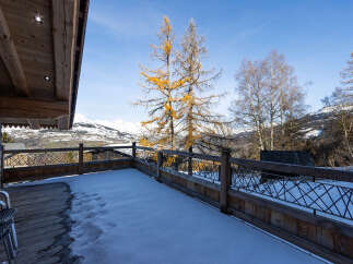 Enjoy breathtaking mountain views from this stunning balcony, perfect for enjoying your morning coffee or evening relaxation.