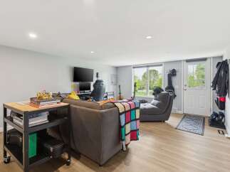 Discover this versatile living space, perfect for relaxation and entertainment.