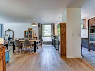 Discover this spacious open-concept living and dining area, perfect for entertaining.
