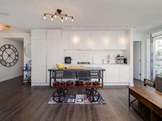 Experience modern living in this stunning open-concept kitchen and living area.