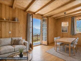Experience breathtaking mountain views from this charming wooden chalet living and dining area.