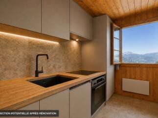 Experience modern living with this beautifully renovated kitchen, featuring sleek cabinetry, a stylish black sink and faucet, and integrated appliances.