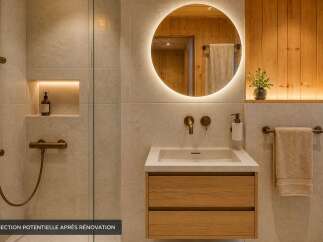 Experience modern luxury in this beautifully renovated bathroom, featuring a sleek vanity with ample storage and a minimalist integrated sink.