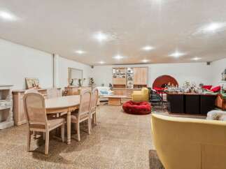 Discover a spacious and versatile living area, perfect for both entertaining and relaxation.