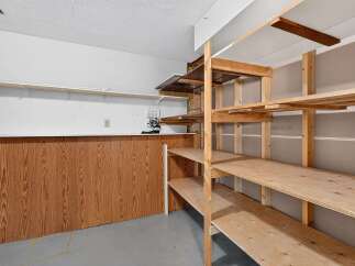 Maximize your storage potential with this versatile shelving unit, perfect for organizing garages, basements, or workshops.