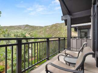 Enjoy breathtaking mountain views from this private balcony, perfect for morning coffee or evening relaxation.