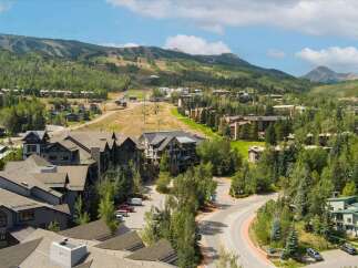 Experience mountain living in this stunning property nestled amidst lush greenery and scenic mountain views.