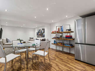 This finished basement offers a versatile living space perfect for entertainment and relaxation.