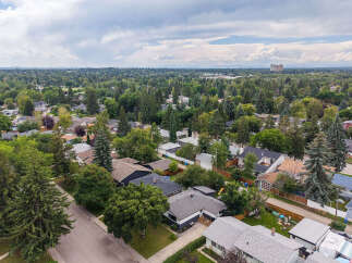 Discover this charming suburban neighborhood with mature trees and well-maintained homes.
