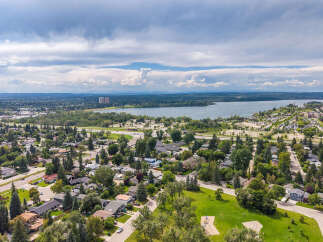 Discover this charming suburban neighborhood with mature trees and well-maintained homes, offering a peaceful residential atmosphere.
