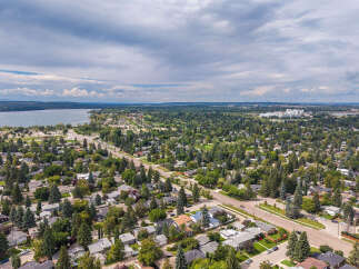 Discover this charming suburban neighborhood with mature trees and well-maintained homes, offering a peaceful retreat.