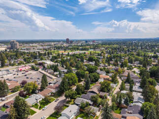Discover this charming suburban neighborhood with a mix of single-family homes and mature trees, perfect for families seeking a peaceful environment.