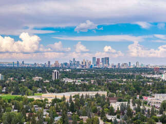 Experience breathtaking panoramic views of the city skyline from this elevated vantage point, showcasing a vibrant urban landscape.