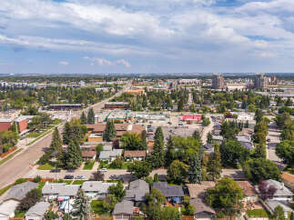 Discover this charming neighborhood with a mix of single-family homes and apartment buildings, perfect for diverse living needs.