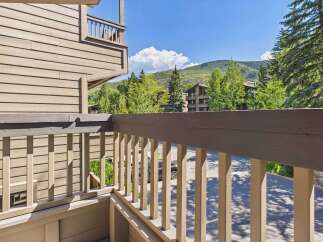 Enjoy the stunning mountain views from this charming property, featuring a private balcony perfect for relaxing outdoors.
