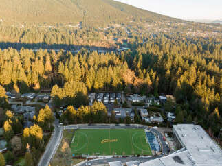 Experience the perfect blend of suburban living and outdoor recreation with this stunning aerial view.