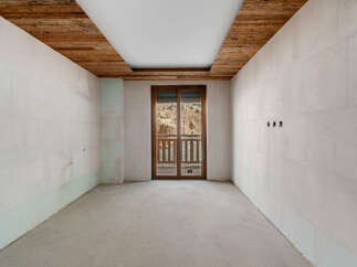 Discover this unfinished interior space, perfect for customization.