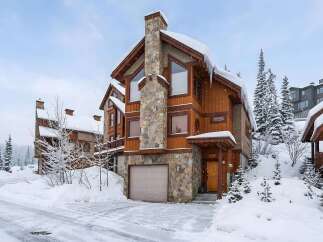Experience the ultimate winter retreat in this stunning mountain home, perfect for ski enthusiasts and nature lovers.