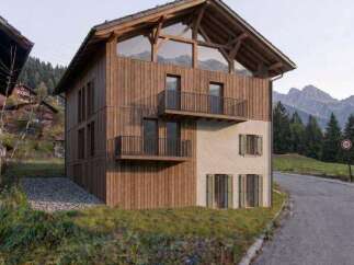 Experience modern alpine living in this stunning wooden chalet, featuring expansive windows that frame breathtaking mountain views.