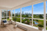 Experience breathtaking city and water views from this stunning corner unit, featuring expansive windows that flood the space with natural light.
