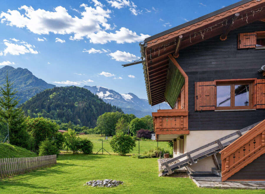 Experience alpine living in this charming wooden chalet, nestled amidst breathtaking mountain scenery.