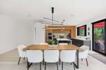 Experience modern living in this stunning open-concept dining and kitchen area.
