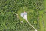 Discover this secluded property nestled amongst lush greenery, offering a private retreat.
