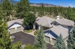 Experience luxury living in this stunning mountain estate, nestled amidst a serene pine forest.