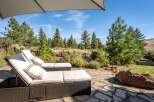 Relax and unwind in this serene outdoor oasis, featuring comfortable lounge chairs perfect for soaking up the sun or enjoying the picturesque landscape.
