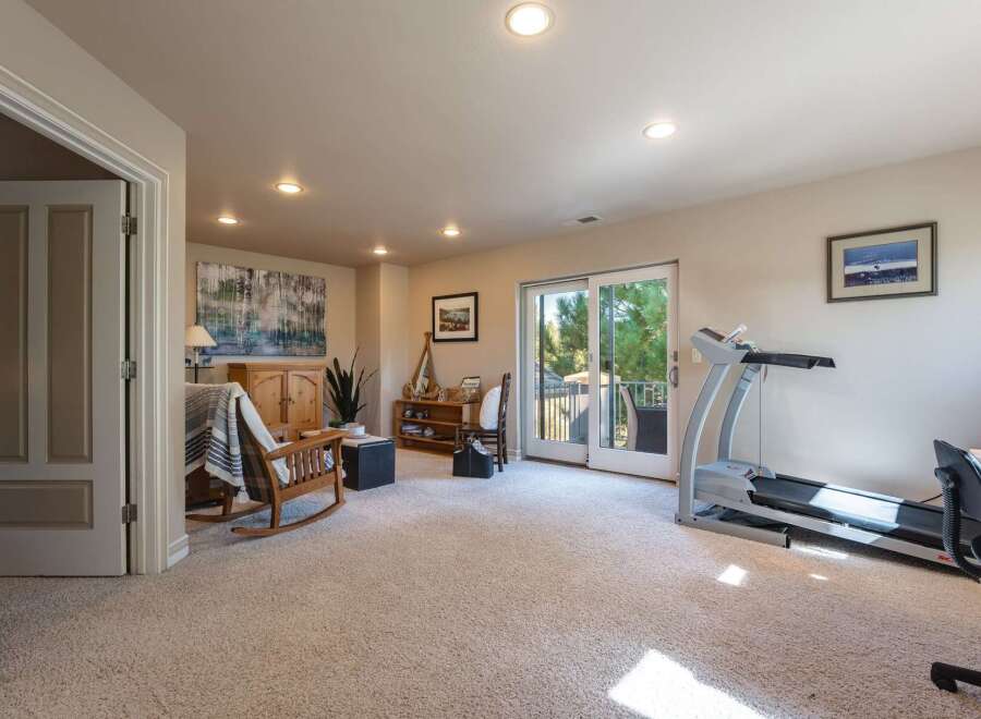 Discover versatile living in this spacious room, perfect for relaxation and fitness.