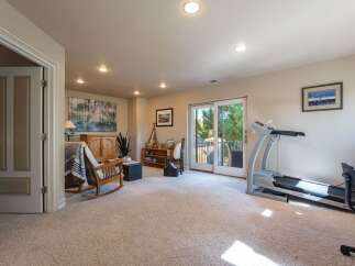 Discover versatile living in this spacious room, perfect for relaxation and fitness.