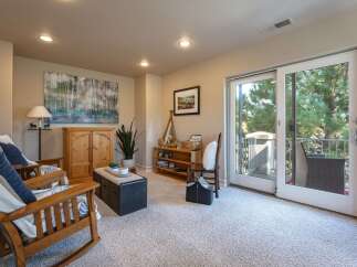 Step into this inviting living space featuring comfortable rocking chairs perfect for relaxation.