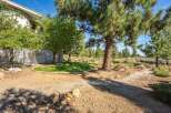 Enjoy the serene outdoor living space with a lush green lawn, perfect for relaxation and recreation.