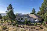 Discover this stunning single-story home nestled in a serene, natural landscape.